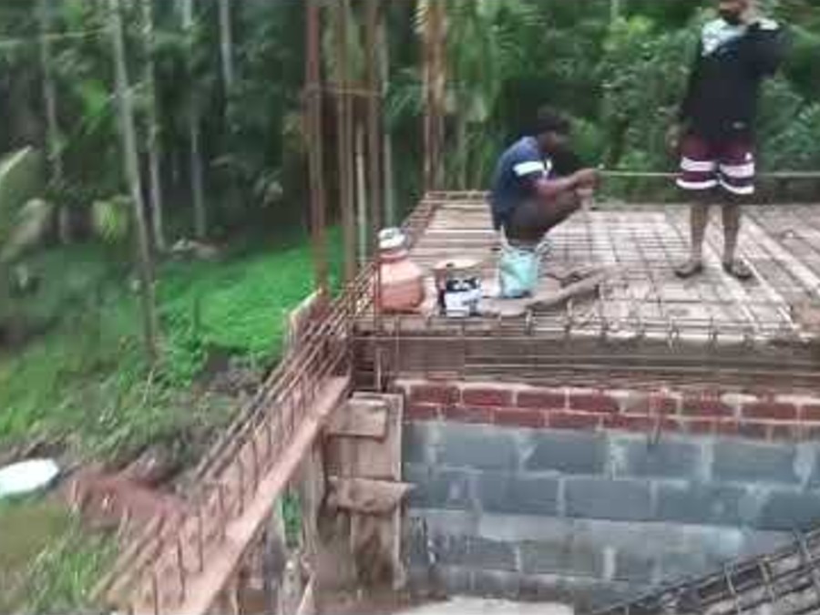 Reinforcement laid for a first-floor slab, checked before the pour