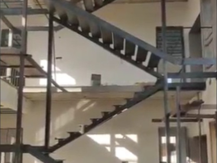 Fabricated steel staircase installed inside a building under construction